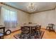 Traditional dining room with hardwood floors, chandelier, and large window at 132 S First St, Jamestown, IN 46147