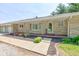 Charming one-story home with stone facade, two-car garage, and covered front porch at 132 S First St, Jamestown, IN 46147