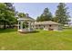 Backyard with a gazebo, green grass, and the side of the house at 132 S First St, Jamestown, IN 46147