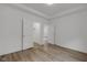 Bright bedroom with two closets and wood-look floors, providing a spacious and versatile area at 1411 N Grant Ave, Indianapolis, IN 46201