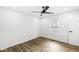 Bedroom with ceiling fan, window, and closet at 1425 N Grant Ave, Indianapolis, IN 46201