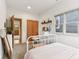 Serene bedroom with closet, light-filled windows and neutral walls at 1436 Central Ave, Indianapolis, IN 46202