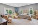 Spacious bedroom bathed in natural light with large windows and eclectic decor at 1436 Central Ave, Indianapolis, IN 46202