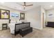 Modern bedroom features neutral colors, and a ceiling fan at 1436 Central Ave, Indianapolis, IN 46202