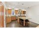 Well-equipped kitchen features stainless steel appliances, granite countertops, and a breakfast bar at 1436 Central Ave, Indianapolis, IN 46202