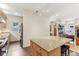 Open kitchen features granite countertops, stainless appliances, and a center island with seating at 1436 Central Ave, Indianapolis, IN 46202