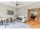 Bright living room features hardwood floors, ceiling fan, and comfortable seating at 1436 Central Ave, Indianapolis, IN 46202