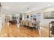 Open-concept living and dining area with hardwood floors and abundant natural light at 1436 Central Ave, Indianapolis, IN 46202
