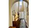 Inviting hallway with tall ceilings and an arched entryway showcasing tasteful decor and wood accents at 1518 Valdarno Dr, Greenwood, IN 46143