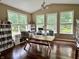 Hobby room with hardwood floors, shelving, and a large table perfect for crafts and other creative pursuits at 1518 Valdarno Dr, Greenwood, IN 46143