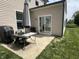 Backyard patio featuring an outdoor seating area and access to the backyard at 1518 Valdarno Dr, Greenwood, IN 46143