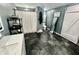 Modern bathroom featuring sleek tiled floors, and a glass enclosed shower at 1579 Crest Dr, Shelbyville, IN 46176