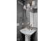 Stylish bathroom with gray paint and framed mirror above sink at 1675 Solebar Way, Westfield, IN 46074