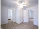 A bedroom featuring neutral paint, flooring and trim with nearby closet and doorway at 2012 George St, Anderson, IN 46016
