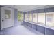 Sunroom features natural light with room for seating and decor at 2012 George St, Anderson, IN 46016