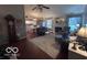 Open concept living room with fireplace and hardwood floors at 2018 Alysheba Dr, Indianapolis, IN 46234