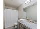 Well-lit bathroom with a large vanity, a modern sink, and a shower and tub combination at 2210 Bridlewood Dr, Franklin, IN 46131