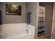Relaxing bathroom showcasing a luxurious soaking tub with elegant fixtures and a calming color scheme at , Plainfield, IN 46168