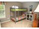 Cozy bedroom with a bunk bed, neutral walls, and plush carpet flooring at , Plainfield, IN 46168