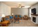 Comfortable living room with plush seating, a cozy fireplace, and plenty of natural light at , Plainfield, IN 46168
