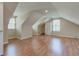 Finished attic featuring hardwood floors and large window at 2234 Burgundy Way, Plainfield, IN 46168