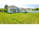 A generously sized backyard that boasts lush green grass, a well-maintained lawn, and a home with serene surroundings at 2234 Burgundy Way, Plainfield, IN 46168