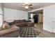 Spacious living room with a large sectional sofa flowing into the connected kitchen area at 2704 13Th St, Columbus, IN 47201