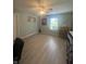Bright bedroom with natural light, features a ceiling fan, a window, and ample space for relaxation at 2916 Wind Chime Cir, Greenwood, IN 46143