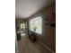 Bright hallway with a bay window, bench seating, and decorative wall art at 2916 Wind Chime Cir, Greenwood, IN 46143