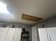 Interior storage area showing access panel to attic at 2916 Wind Chime Cir, Greenwood, IN 46143