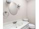 Bathroom featuring an oval mirror, vanity, and modern fixtures at 2947 Talping Row, Indianapolis, IN 46268