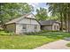 Exterior of a single-Gathering home with stone and siding, well-maintained lawn at 2947 Talping Row, Indianapolis, IN 46268