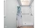 Bathroom shower with leaf-patterned shower curtain and built in shower caddy at 2947 Talping Row, Indianapolis, IN 46268