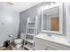 Bright bathroom with large mirror and white vanity at 312 W Clark Ln, Fairland, IN 46126
