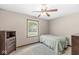 Cozy bedroom with natural light and neutral décor at 312 W Clark Ln, Fairland, IN 46126