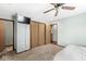 Bedroom with closet, ceiling fan, and neutral walls at 312 W Clark Ln, Fairland, IN 46126