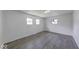 Well-lit bedroom with multiple windows and modern flooring, providing a comfortable and airy atmosphere at 3220 Newton Ave, Indianapolis, IN 46201