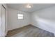 Bedroom offers neutral walls, new flooring and a closet at 3220 Newton Ave, Indianapolis, IN 46201