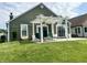 Backyard patio with a white pergola and patio furniture creating an outdoor space at 3404 Maritime Dr, Indianapolis, IN 46214