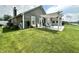 Large backyard with a stamped concrete patio, pergola and a beautiful lawn at 3404 Maritime Dr, Indianapolis, IN 46214