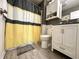 Chic bathroom featuring a stylish shower curtain, and modern vanity at 3404 Maritime Dr, Indianapolis, IN 46214