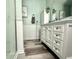 Bathroom featuring a vanity with a sink, vanity mirror, and modern fixtures at 3404 Maritime Dr, Indianapolis, IN 46214