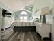 A cozy bedroom with a modern decor, natural light, and sleek, stylish furnishings at 3404 Maritime Dr, Indianapolis, IN 46214