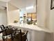 Kitchen breakfast bar area with quartz countertops and seating at 3404 Maritime Dr, Indianapolis, IN 46214