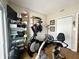 Spacious exercise room with sliding glass door and diverse workout equipment at 3404 Maritime Dr, Indianapolis, IN 46214