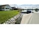 Scenic waterfront view of well-manicured lawns, private docks, and houses along the calm water at 3404 Maritime Dr, Indianapolis, IN 46214