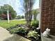 Eye-catching landscaped flower bed with decorative yard ornament at 3404 Maritime Dr, Indianapolis, IN 46214