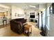 Spacious living room with brick fireplace, modern TV, and vaulted ceilings at 3404 Maritime Dr, Indianapolis, IN 46214