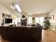 Spacious living room with fireplace, vaulted ceiling, and sliding glass doors at 3404 Maritime Dr, Indianapolis, IN 46214