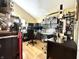 Spacious home office featuring multiple monitors, ample lighting, and ergonomic chair at 3404 Maritime Dr, Indianapolis, IN 46214